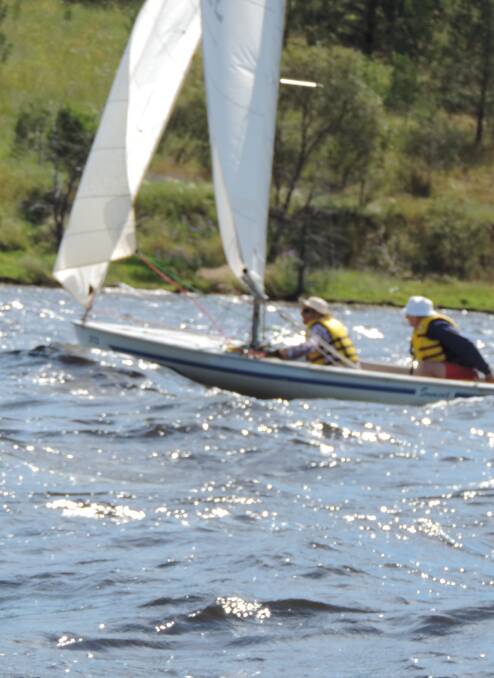 Choppy: Sailors navigate rough waters at Lake Keepit on Saturday.