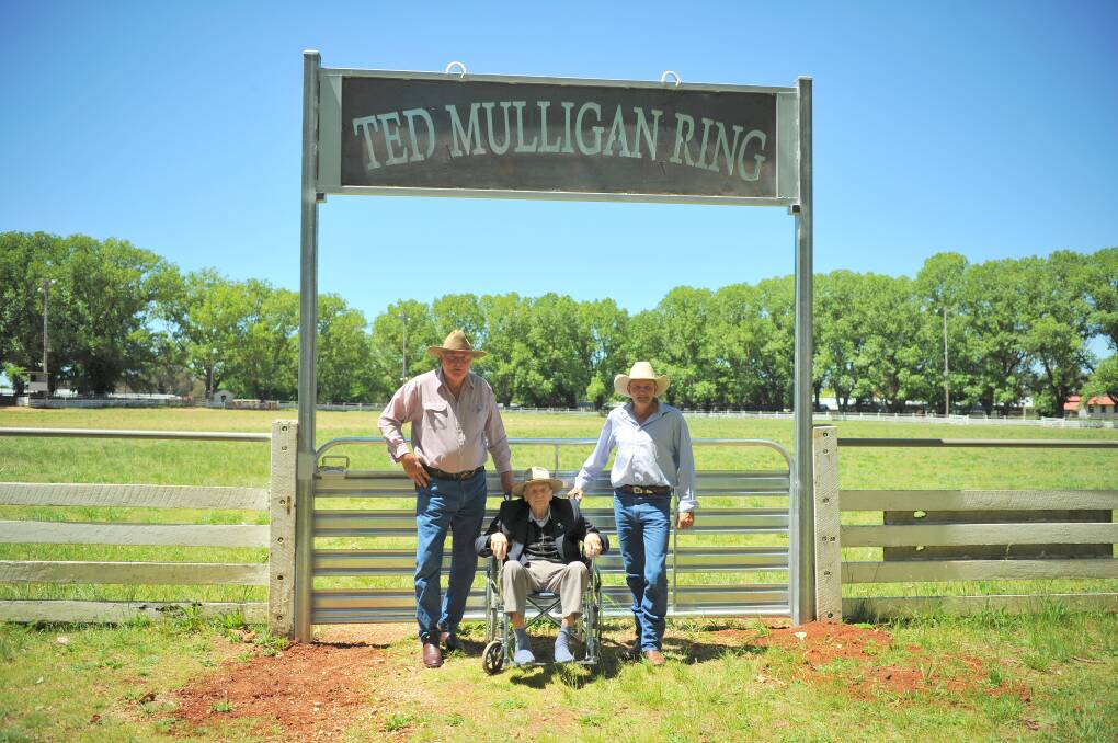Guyra Campdraft Club hardworking committee member Doug Ferris and president Kevin Davidson made a fitting tribute to Ted Mulligan on his 104th birthday recently by replacing the old ring entry gate and naming the ring in his honour. Photos: Donna Davidson 