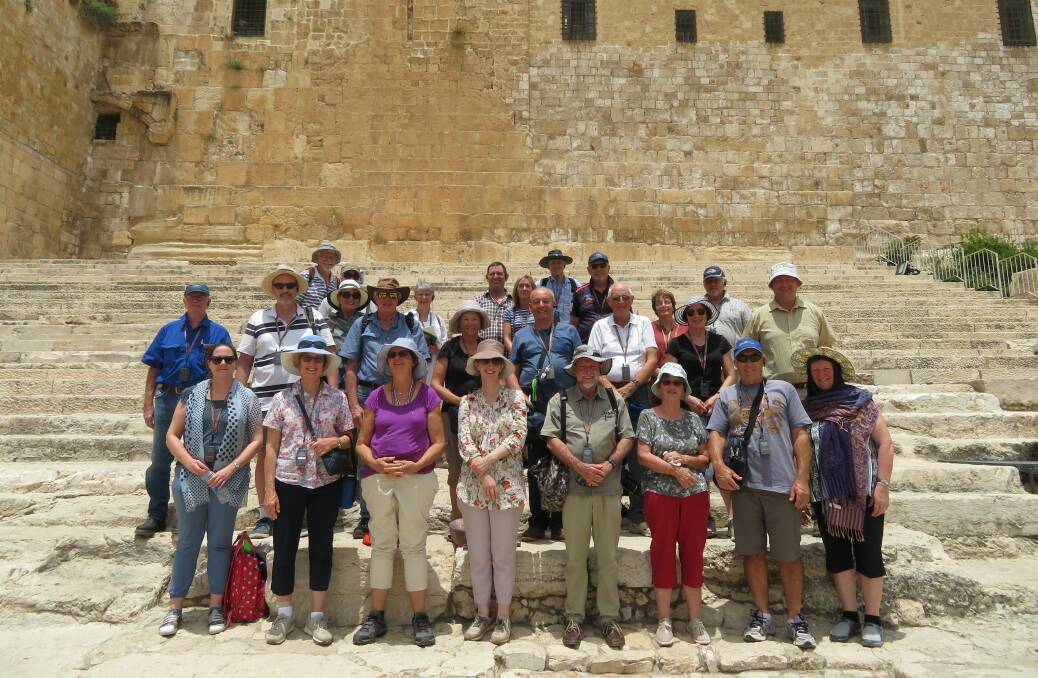 Bringing the Bible to life: The 29 Tamworth pilgrims on the steps of the old temple in Jerusalem.