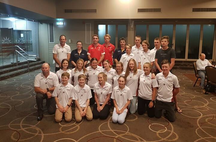 The Inverell RSM NIAS AFL Squad with Sydney Swans players Daniel Robinson and Callum Mills. 