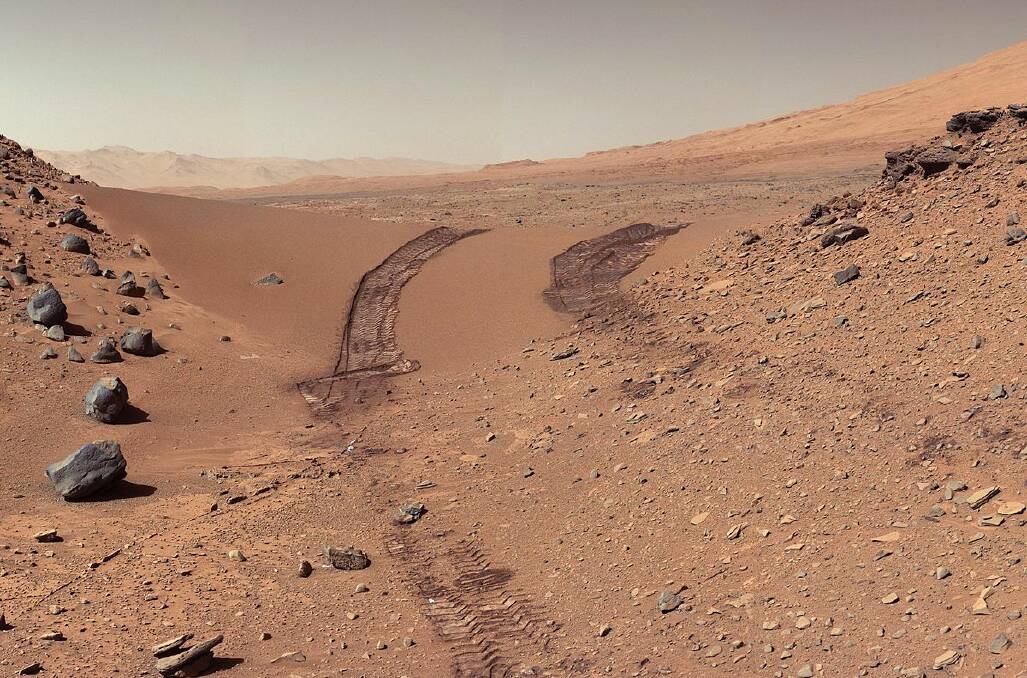 Space tracks: A look back at a dune that NASA's Curiosity Mars Rover drove across in 2014.