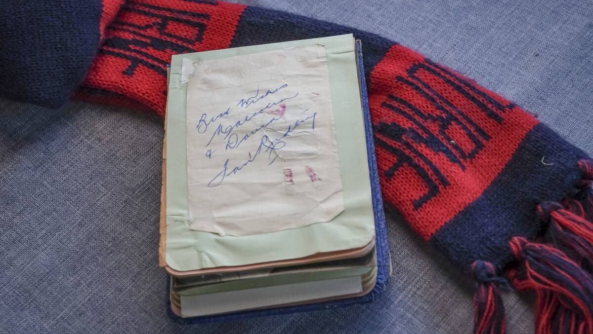 Malcolm Cowan's autograph book with Ian Ridley's autograph. Picture: Craig George