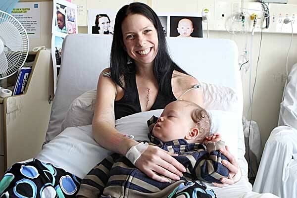 THE Smile says it all: Leonnee Pinchen-Martin with her baby, Levi, in St Vincent’s Hospital in Sydney following her successful heart transplant. Photo: Janie Barrett, The Sydney Morning Herald