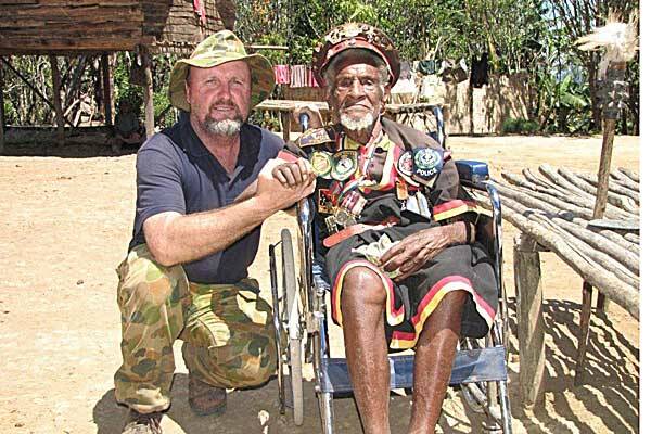 VILLAGE FRIEND: Peter Holledge and Mr Ovuru Ndiki, who lives at Naduri along the Kokoda Track.