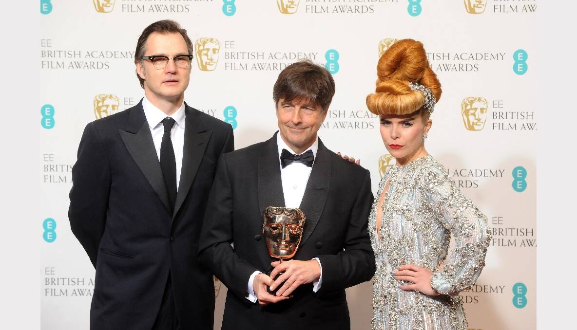 Thomas Newman, winner of Original Film Music for 'Skyfall', poses in the press room with presenters David Morrissey (L) and Paloma Faith (R). Photos: GETTY IMAGES, REUTERS