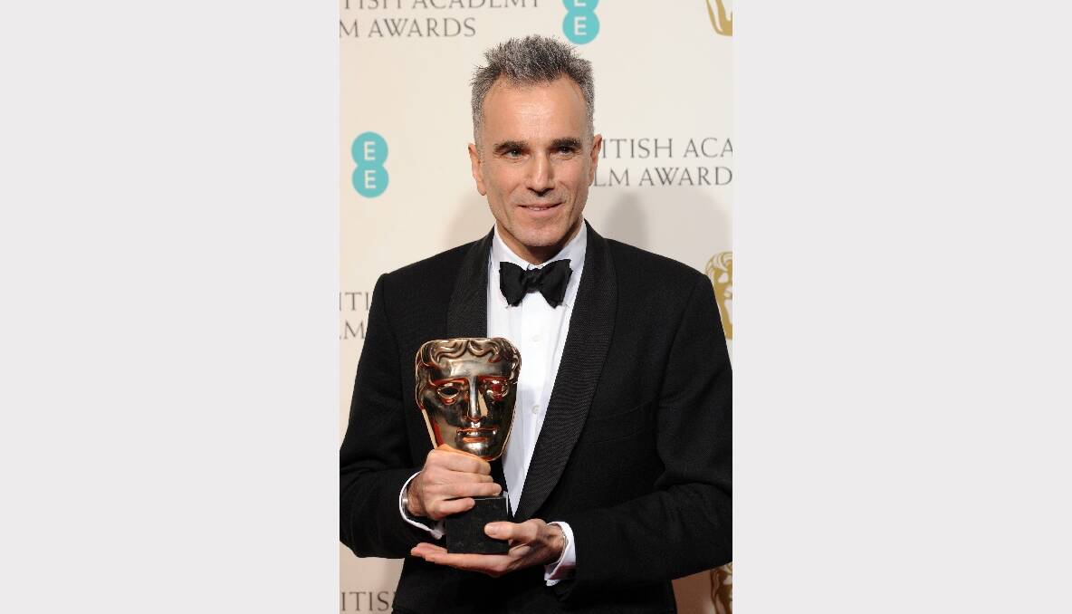 Daniel Day-Lewis, winner of the Leading Actor award for 'Lincoln', poses in the press room. Photos: GETTY IMAGES, REUTERS