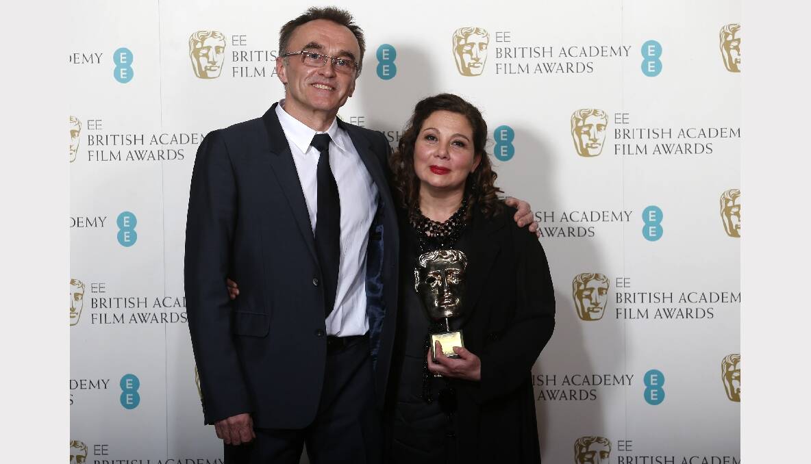 Tessa Ross celebrates with Danny Boyle after winning the Award for Outstanding Contribution to British Cinema the British Academy of Film and Arts awards. Photos: GETTY IMAGES, REUTERS