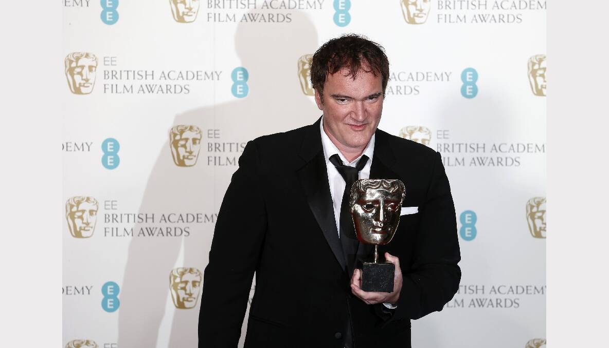 Quentin Tarantino celebrates after winning the Best Original Screenplay award for "Django Unchained". Photos: GETTY IMAGES, REUTERS