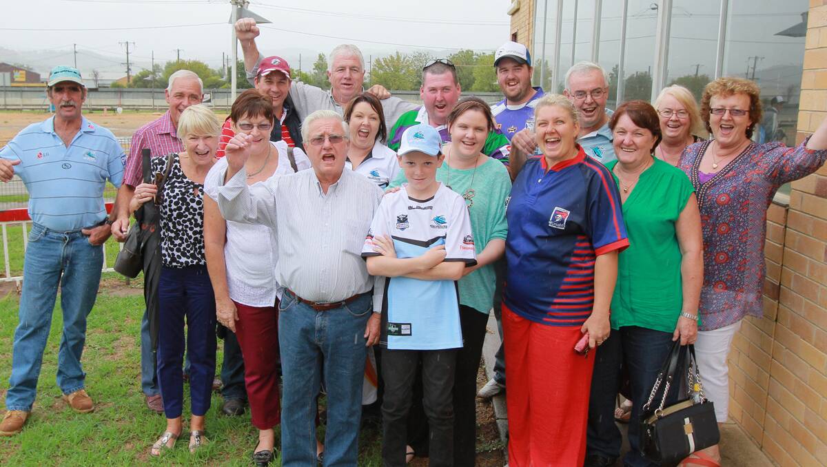 David Rose (third from right at back) and his Bingara crew celebrated at the races and then the NRL Sharks-Knights game.  Photo: Robert Chappel 230213RCD02