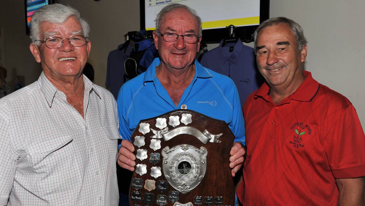 Still going strong (from left) Barry Lavell, Bruce Collier and Arthur Ruttley with the 35-year-old Lavell Ruttley Shield.  Photo: Barry Smith 171112BSF02