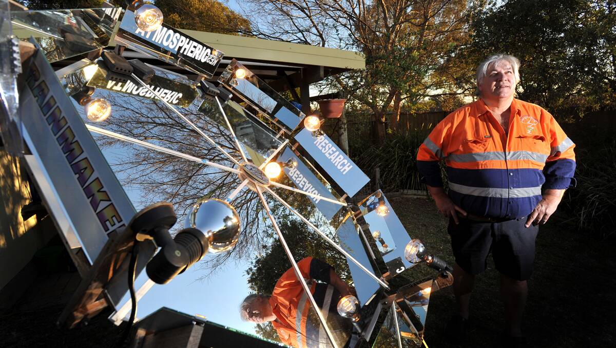 INVENTOR AND IMAGINER: Peter Stevens with his atmospheric ionisation research machine that he claims has a 100 per cent success rate at making it rain. Photo: Barry Smith 040912BSF02