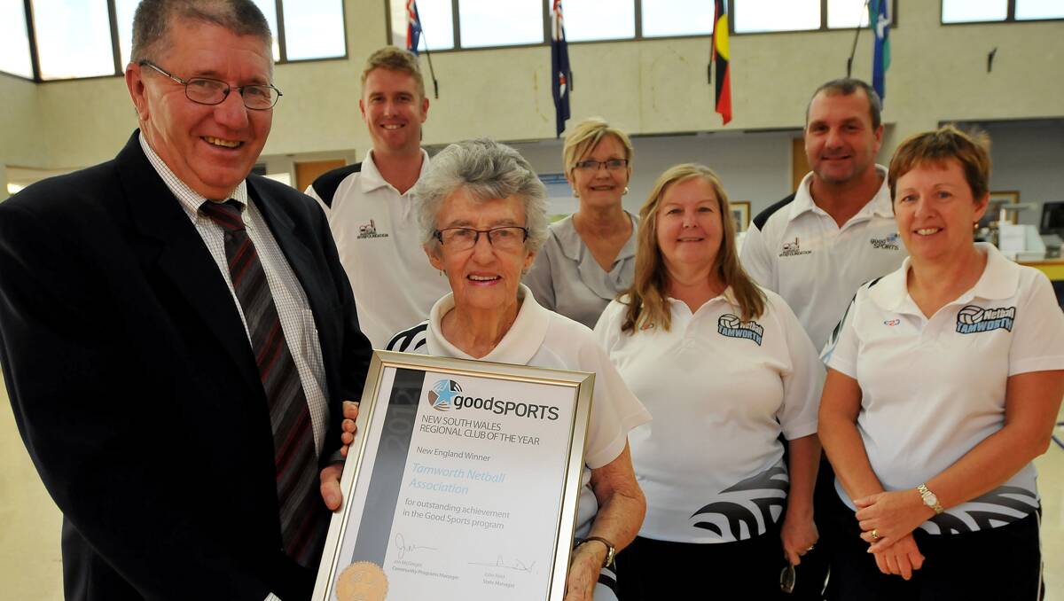 Tamworth Mayor Col Murray presents Tamworth Netball Association president Dot Lockwood with the New England Good Sports Club of the Year award. Also pictured are (rear from left) Good Sports project officer Luke Adams, Newcastle Permanent manager Julie Callander, Tamworth Netball secretary Lyn O’Brien, Good Sports Northern NSW Regional Manager Marc Glanville and Tamworth Netball treasurer Janet Jamieson. Photo: Geoff O’Neill 130213GOD02