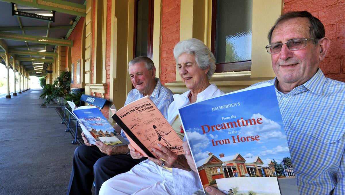 ON TRACK WITH HISTORY: Warren Newman, left, Marlene and Barry Ford recreate bygone days at Tamworth Railway Station to mark the relaunch of Jim Hobden’s original book From The Dreamtime To The Iron Horse. Photo: Barry Smith 100113BSD02