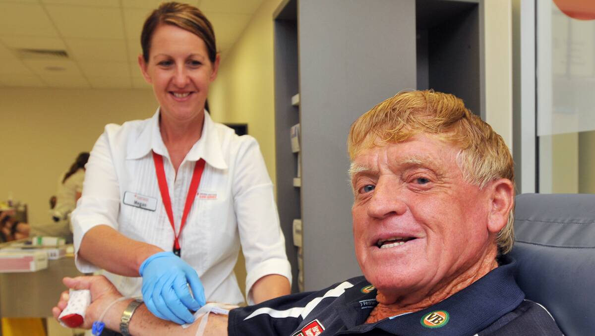 LIFE SAVER: Wally Warner was the first to donate at the new centre and celebrated  their first birthday with staff and fellow blood donors. 110913GOB01