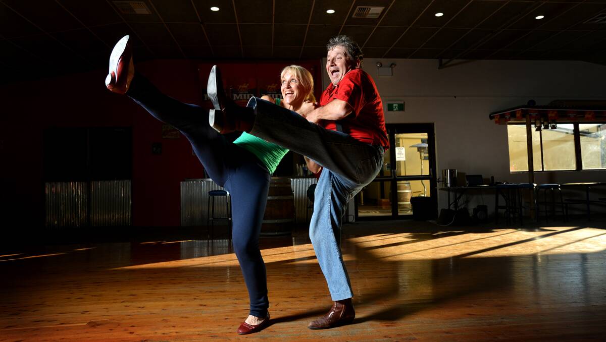 HIGH-STEPPERS: Mandy Lord and dance instructor Graham Dwyer rehearsing their fancy footwork for Dancing With the Tamworth Stars. Photo: Barry Smith 300513BSD01