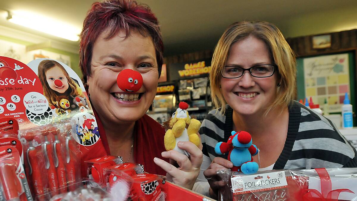 ON THE NOSE: Maryann Parsons, left, and Melissa Moore are holding a SIDS fundraising craft fair tomorrow morning in Melissa’s store, Lots Moore Scrapbooking, at  the Robert St Shopping Village. Photo: Geoff O’Neill 
