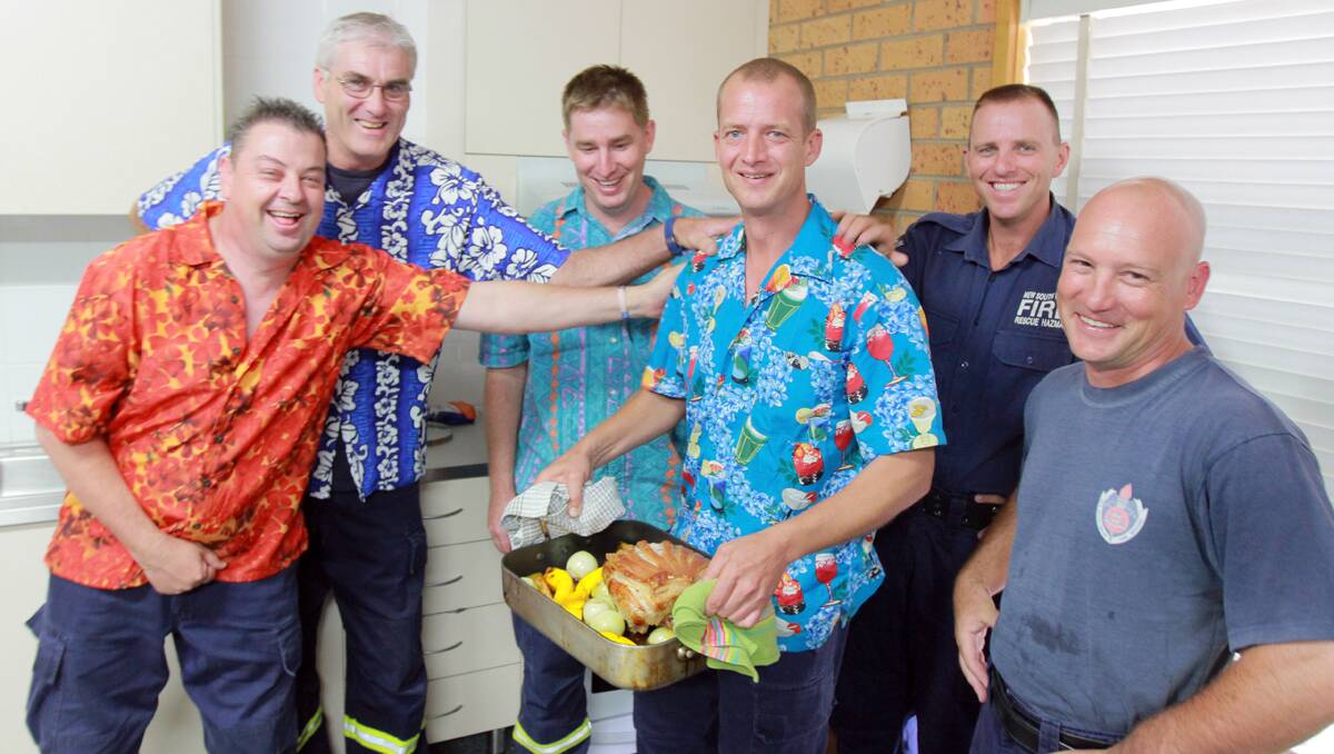 LEFT – CHRISTMAS LUNCH: firefighter Andrew Coe, left, station commander Phil Cox, with other firefighters Sam Mayo, Gary Cork, the 'temporarily homeless' Matt Newberry and Mark Stewart about to enjoy their Christmas lunch at the fire station in Carthage St on Tuesday. Photo: Robert Chappel 251212RCA02