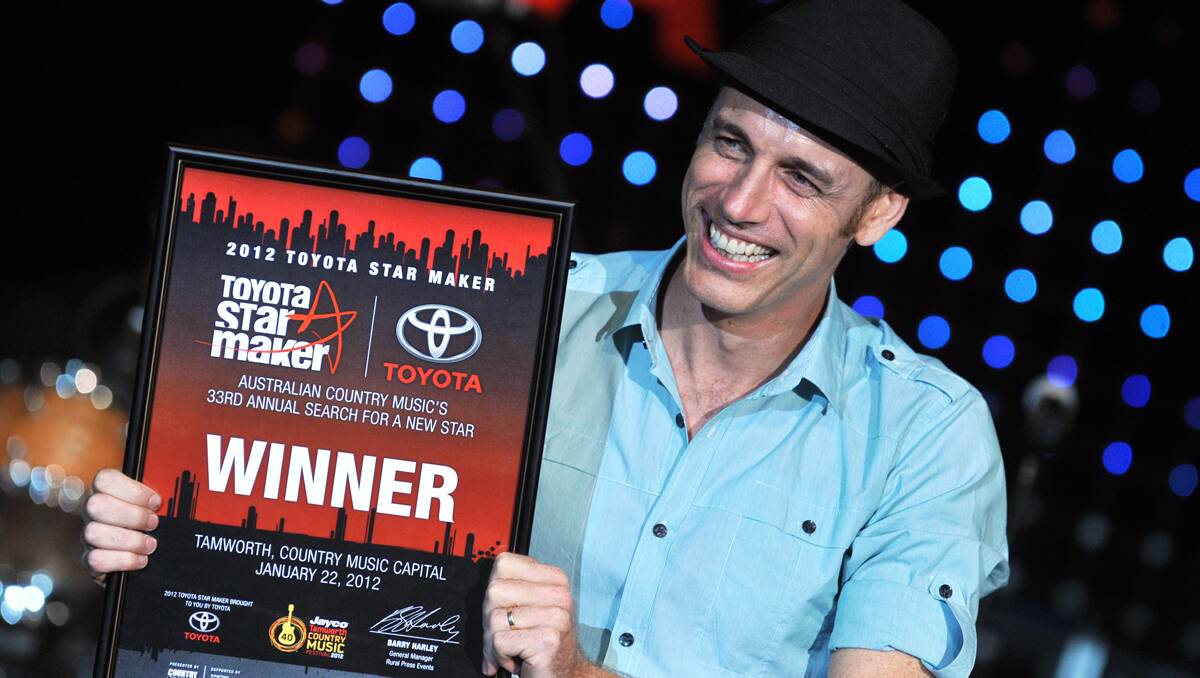 COUNTRY  CONNECTION: Toyota has been associated with country music in Australia for 20 years, including with Toyota Star Maker, and this year’s winner Bob Corbett. Photo:  Barry Smith 220112BSA81
