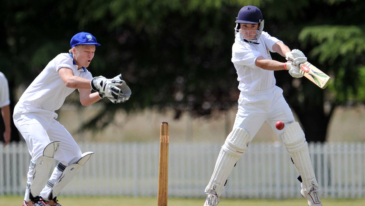 Ryan Hansen cuts this delivery for Northern Inland during last month’s Central North Under 17 trial against Hunter Valley. Both Hansen and HV keeper Jaymes Thomas have been named in the CN Bradman Cup Under 16 side. Photo: Grant Robertson 141011GRA06