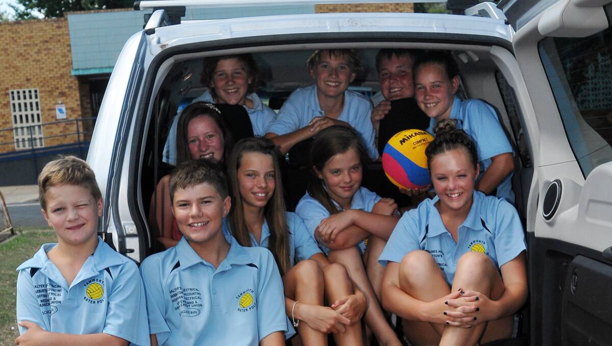Some of Tamworth’s Under 12 water polo squad jamming into one of the transport vehicles for the trip to Dawn Fraser Pool and the Balmain Development Carnival. Photo: Geoff O'Neill 050113GOC01