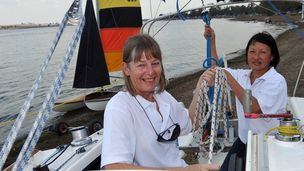 ACROSS THE STRAITS: Denise Bruschweiler training at Lake Keepit with local sailing partner Kathy See-Kee who will meet her in Hobart. Photo: Geoff O’Neill 091212GOC01
