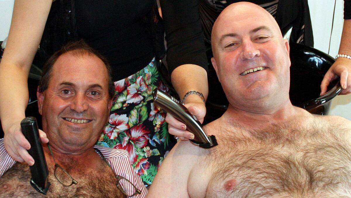 SMOOTH OPERATORS: The big-belly shavers – Bill Poulos, left, and Dennis Picone – bare all for Relay For Life.