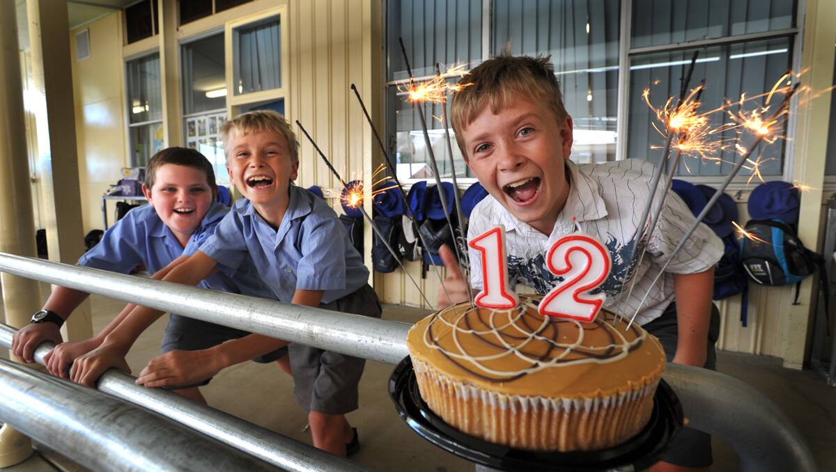 EXCITED: Barraba birthday boy Zac McDouall celebrates his 12th birthday today – 12.12.12. He’s pictured here with his friends Riley Bomford and brother Josh.  Photo: Barry Smith  111212BSA02