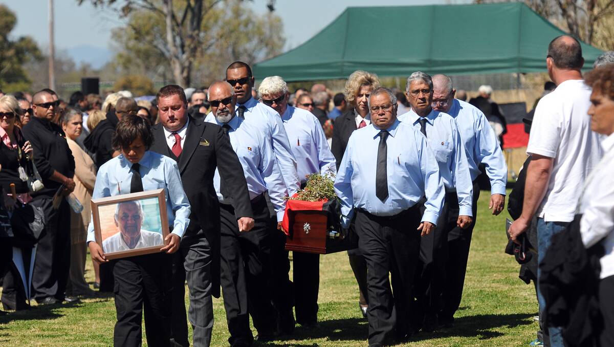 SAYING GOODBYE: Family, friends and community members paid tribute to Joe Trindall yesterday, a man who touched many and believed in equality for everyone.  Photo: Geoff O’Neill 040912GOD10
