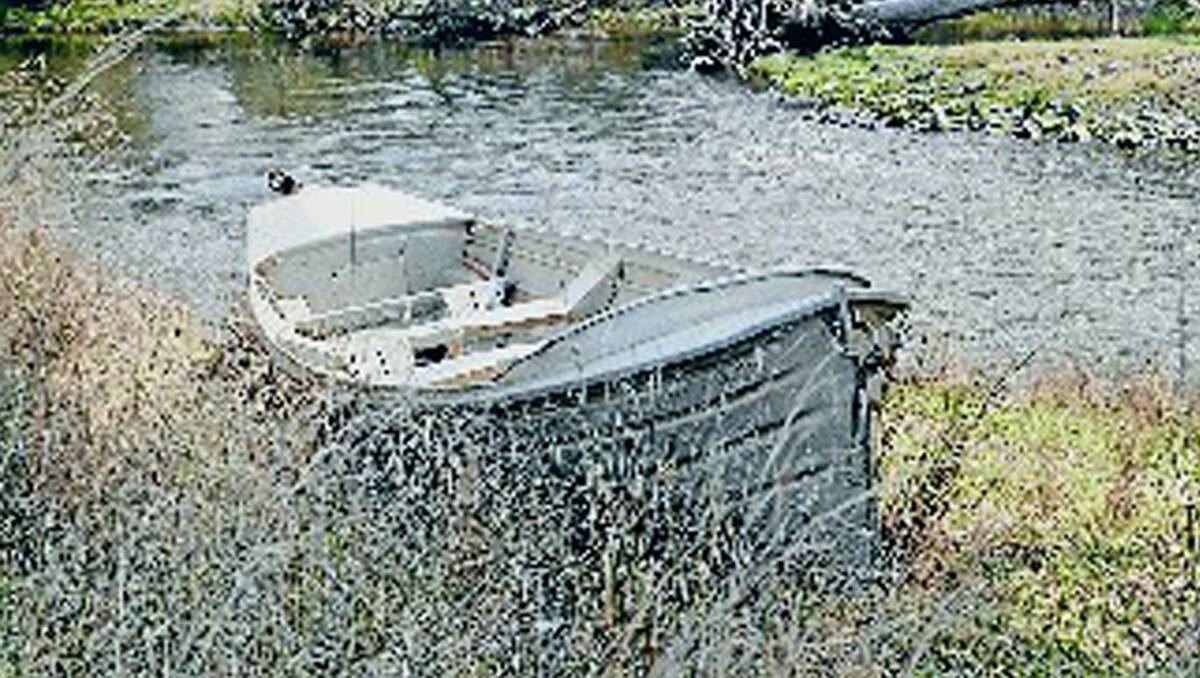 The boat that overturned on the Gwyder River last week, claiming the lives of two members of the Narrabeen Surf Life Saving  Club
