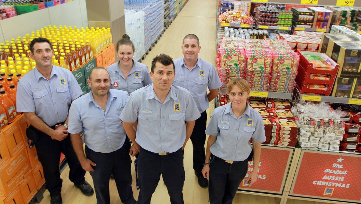ALDI'S TAMWORTH TEAM: (From left:) Joe Biscotto, Benedetto D’Ascanio, Anna Muldoon, store manager Craig Clark, Matt Brock and Kelly O'Connell. Photo: Robert Chappel 271112RCC01