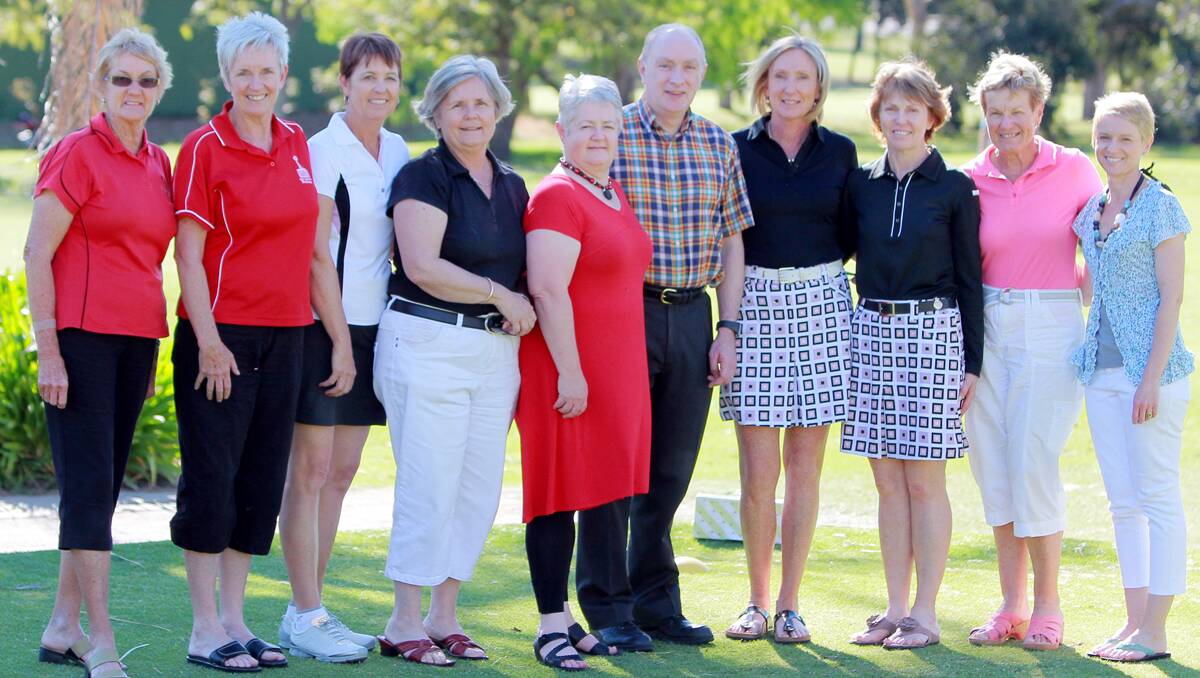 Winners, runners-up and sponsors (from left) Helen Savage, Jenny Butler, Narelle  Dunst, Evelyn Parnell, Gwen and Grant Harvey, Jan Kirk , Mary-Anne Macklinshaw, Annette Roberts and Natalie Studte pose after Sunday’s fourball event. Photo: Rob Chappel 071012RCE03