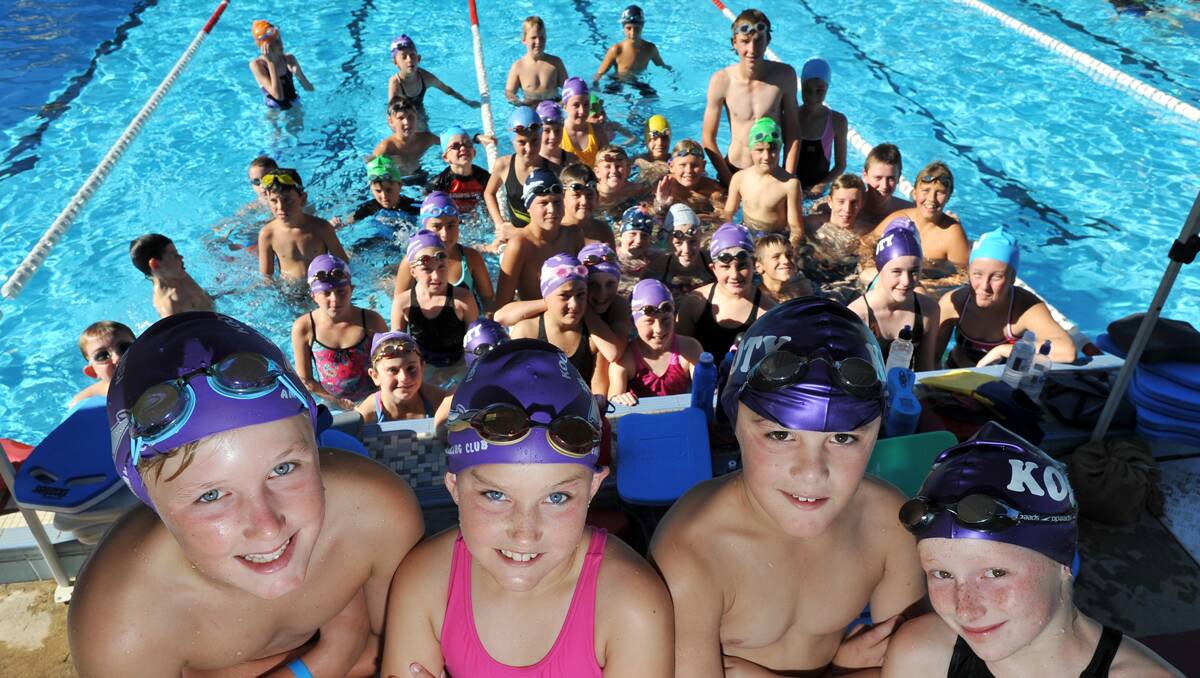 Kootingal Moonbi Swimming Club quartet (from left) Nathan Watts (12), Elsa Hudson (9), Mitchell Henderson (9) and Madi Roach (10) and their clubmates are ready for the club's biggest ever carnival on Sunday.   Photo: Barry Smith 080113BSB02