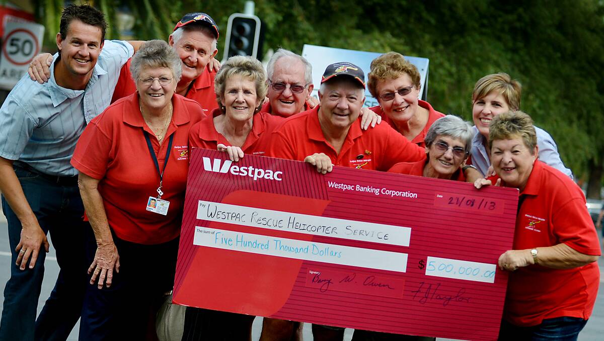 MILESTONE: The Westpac Rescue Helicopter Service Tamworth Support Group has raised more than $500,000  over 12 years. Celebrating are, from left, Chad Griffith, Barb Bynge, Max Cathcart, Sirpa Salmelainen, Don Bynge, John Taylor, Marie Constable, Beryl Bynge, Melinda Heckrotte and Maureen Pontifex. Photo: Paul Mathews 210113PMA02
