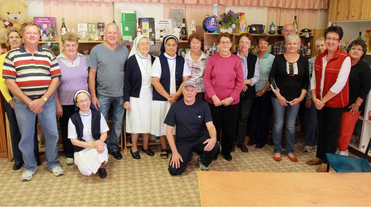 big weekend: The organisers of this year’s fete have been hard at work. Picture, from left, standing, are Helen Reid, Max Hogg, Shirley Burke, Peter Powell, Sr Arcadius, Sr Lusila, Betty Burke, Ethel Sevil, Mary  Camden, Mary Leehy,  Bernie Camden, Rozanne Paull and Helen Bryan. Front, from left, Sr Teresa, Ian Rust, Chris Powell and Marg Tarbert.