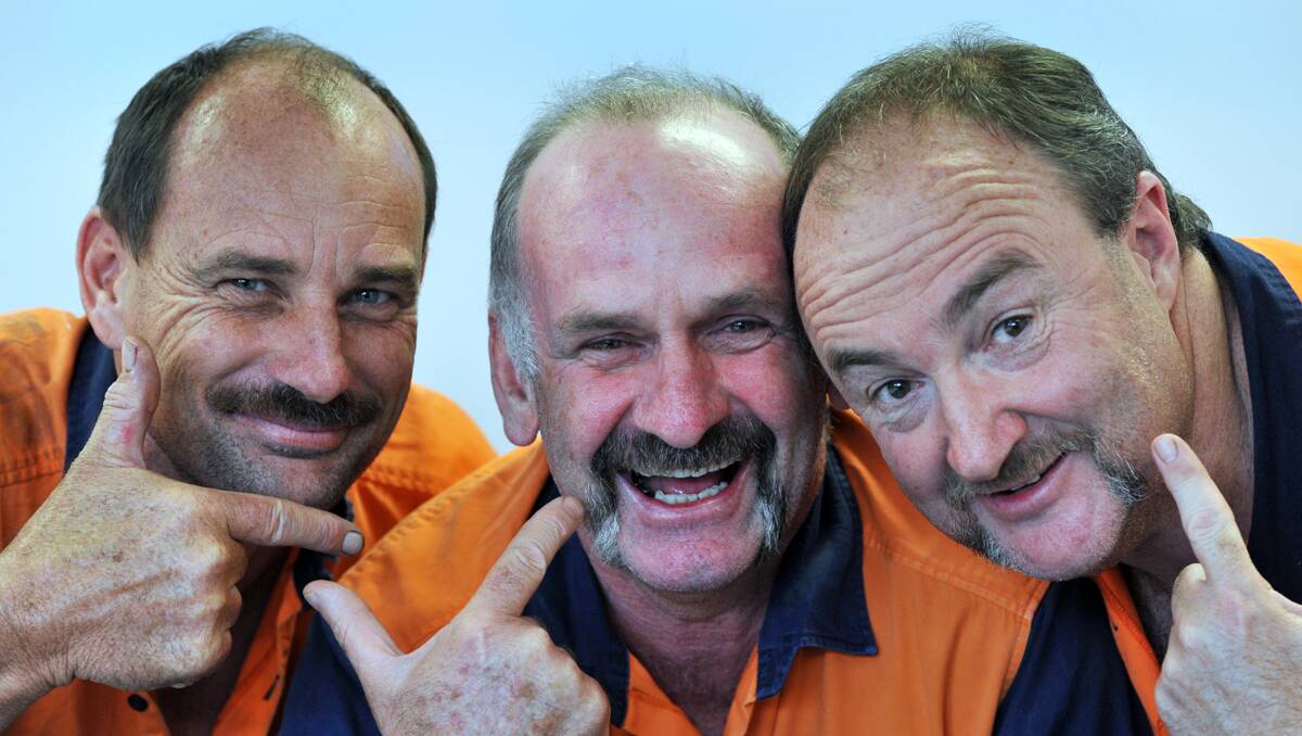 HAIRY: The men of Print Leader, including, from left, Terry Skewes, Dave Hedges and Craig Jenner, show off their moustache efforts for popular men’s fundraiser Movember. Photo: Barry Smith 291112BSD02