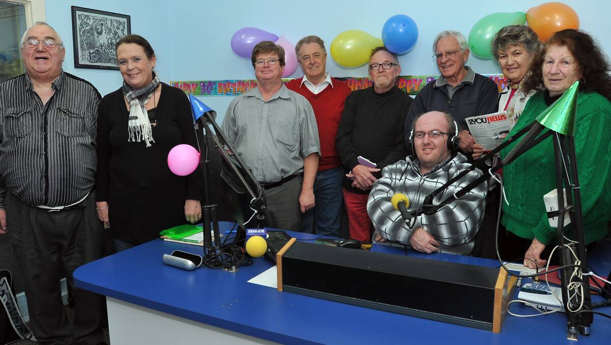 THIRTY YEARS ON AIR: From left, 2YOU FM members and presenters Errol and Vanessa Bourne, president Tim Gaynor, George Frame, Noel Victor, Alec Noble, Trish Griffin, Lorraine Pfitzner and presenter Troy Ortin, who was on air. Photo: Geoff O’Neill 110713GOB01