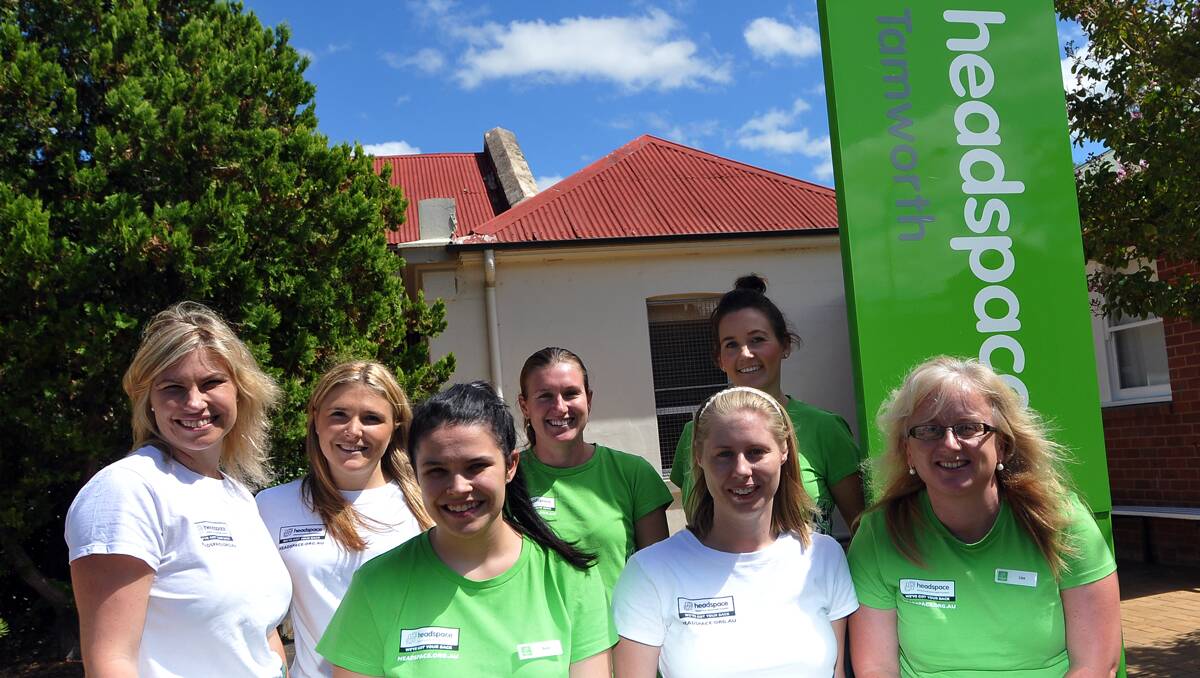 YOUTH-FOCUSED: Staff of the newly opened Tamworth headspace, front from left, Bree Constable, Mel Murphy and Lisa Staples, and back from left, Helen Carter, Jennifer Fisher, Barbara Eames and Katie Bryant, are excited about the new service. Photo: Geoff O’Neill 050213GOB02
