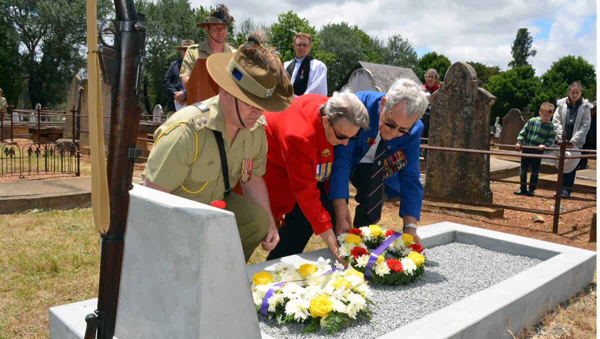LEFT – special occasion: CO of the 12th/16th Hunter River Lancers, Lt Col. Cameron, laying a wreath alongside the great grand-niece of Trooper Harry Fry, Lila Vincent, and her husband, Tom. 