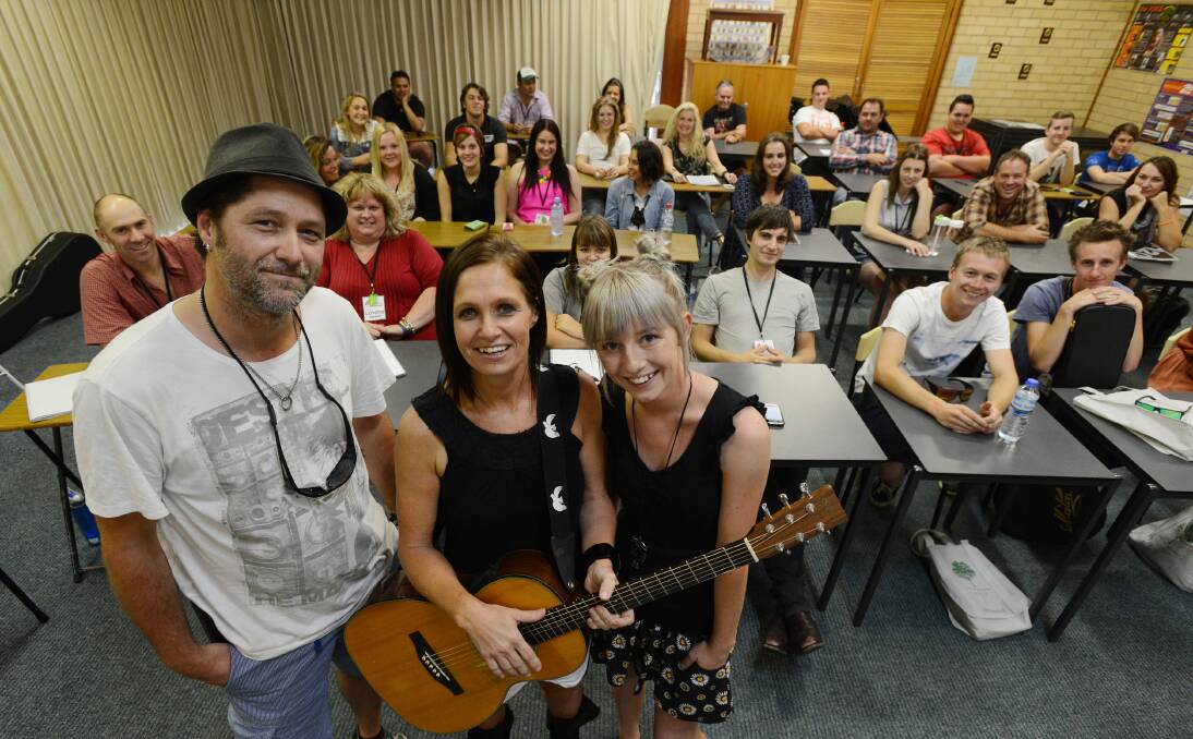 WHERE IT BEGAN: Nash and Kasey Chambers and Ashleigh Dallas dropped in as special visitors to the CMAA Country Music Academy. Photo: Barry Smith 080114BSH09