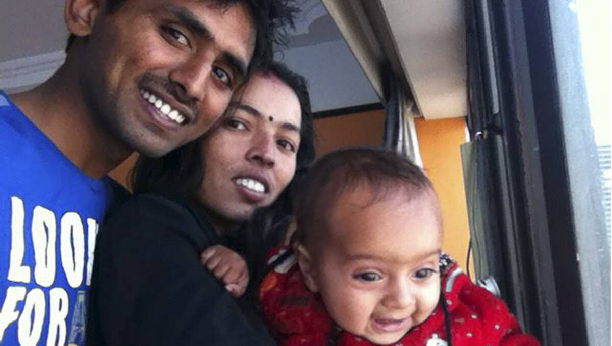 REUNITED SOON: Injured jockey Hari Singh with wife Abu Tuver and daughter Priya.