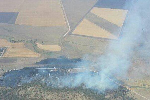 The picture shows the highway cutting through the middle of the fireground. Pic: NSW Rural Fire Service.