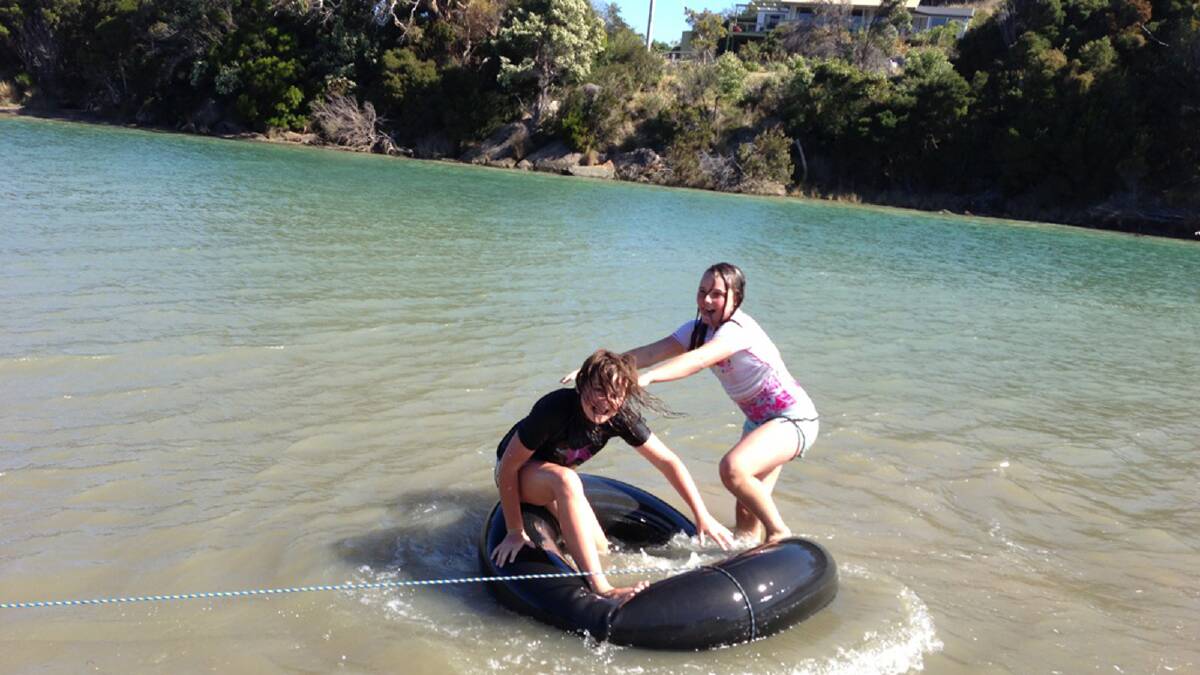 Angela Douglas and Lacey Mansfield enjoying themselves at Muddy Creek Port Sorell. Photo: Debbie Clune/The Advocate