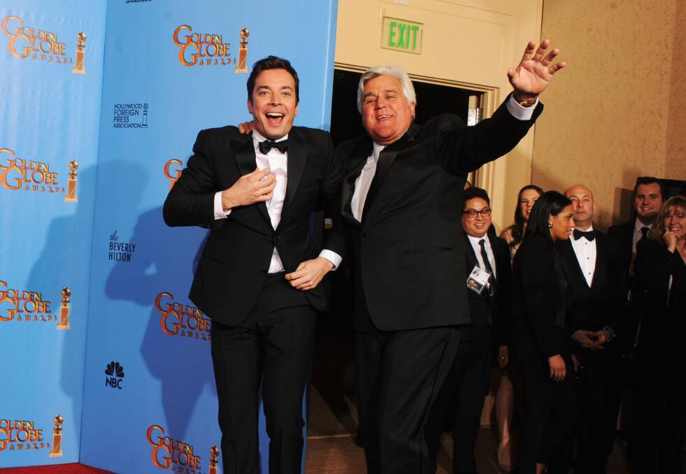 Presenters Jimmy Fallon (L) and Jay Leno pose in the press room during the 70th Annual Golden Globe Awards. Photo by Kevin Winter/Getty Images