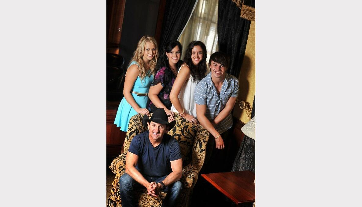 TIME TO SHINE: Lee Kernaghan with Toyota Star Maker grand finalists Christie Lamb, Sarah Head, Kaylee Bell and Nathan Lamont. Photo:Barry Smith 240113BSI07