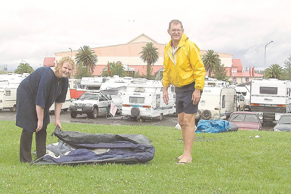 The Leader's photographers took these photos of residents and campers during the 2004 floods which happened at the annual Tamworth Country Music Festival.