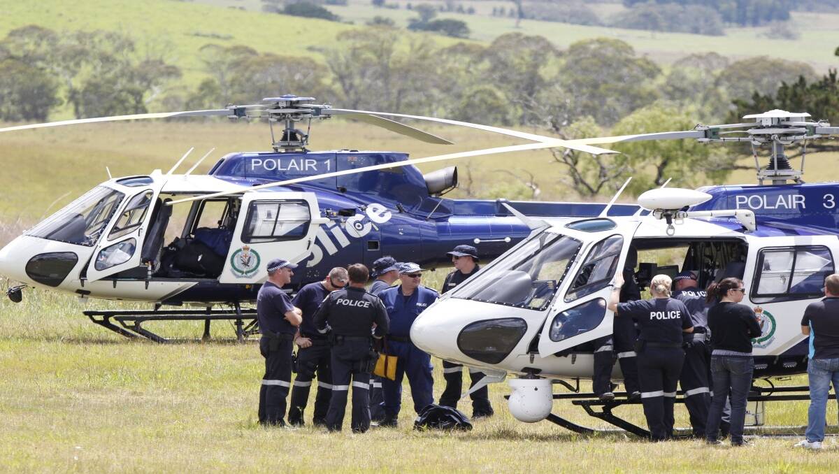 Fairfax images of the hunt for Malcolm Naden which spanned between Nowendoc and Gloucester involving specialist police.