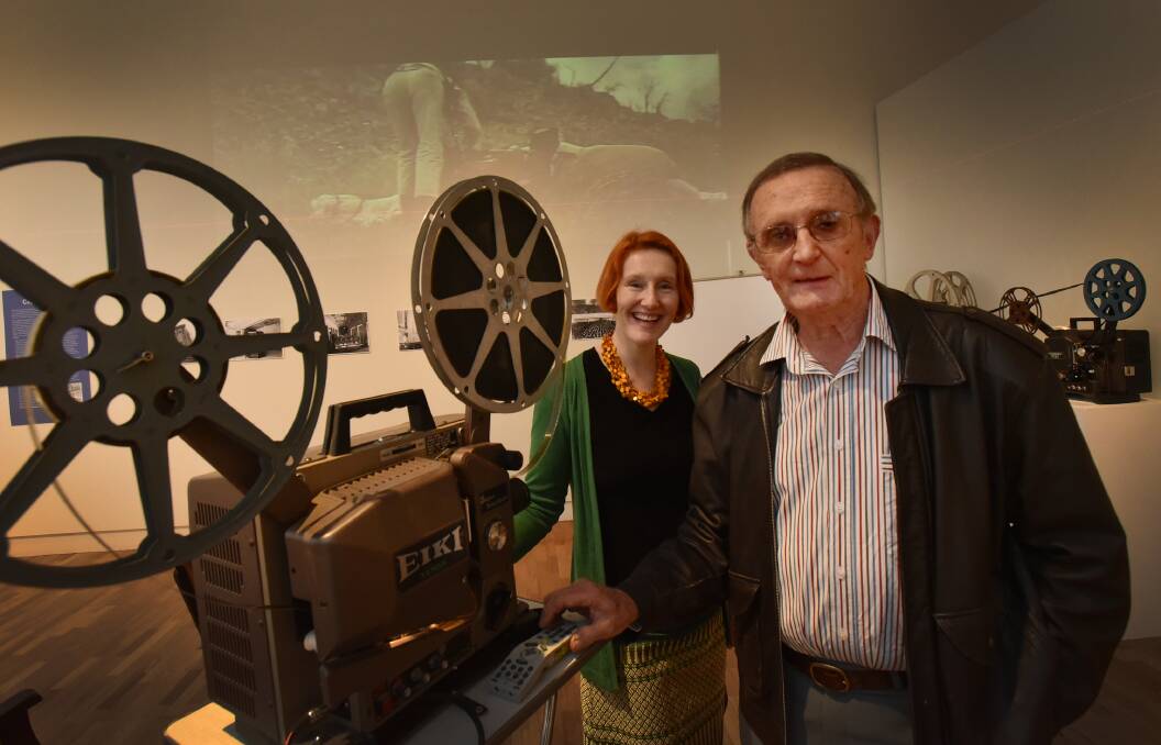 REGION’S SECRETS REVEALED: Our Region In Film and Sound is the new exhibition at Tamworth Regional Gallery. Director Bridget Guthrie is seen here with Tamworth Regional Film and Sound Archive secretary John Vickery. Photo: Geoff O’Neill 240715GOE01
